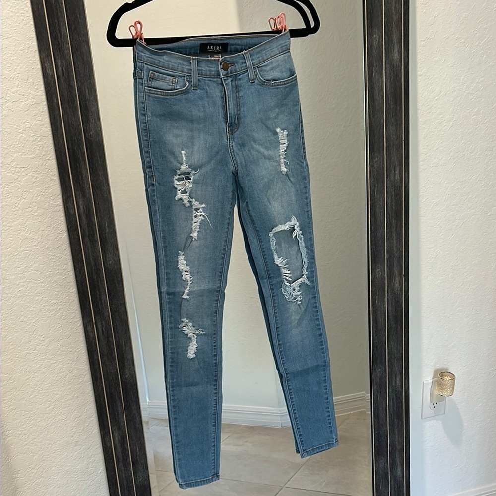 akira destroyed blue jeans